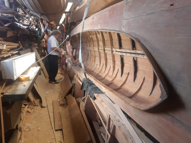 Peter in our workshop while sanding.