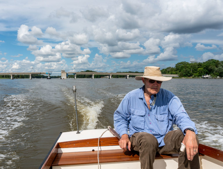 Bernie driving the boat 1 of 1 768x580
