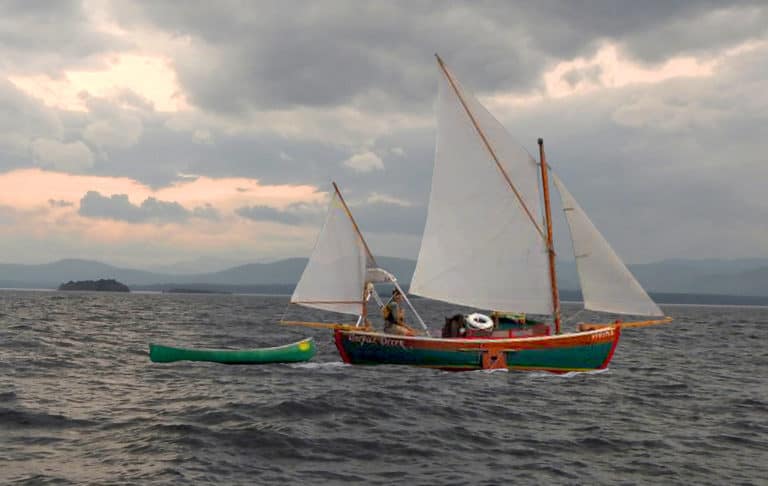 DSCN9923 A Otter under sail past Four Brothers Islands composite cropped 768x486