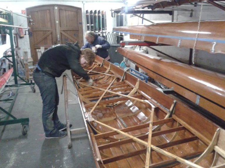 Student helping in the restoration.